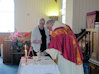  11 Di Bunker assists The Vicar at The Eucharist.jpg 